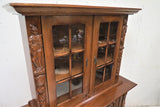 Vintage French Carved Bruegel Style Two Piece China Cabinet With Acorn Feet