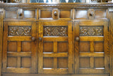 English Acanthus Carved Court Cupboard With Linen Fold Accents