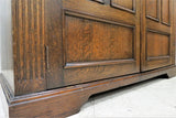 Vintage English Oak Double Door Cathedral Carved Wardrobe or Armoire