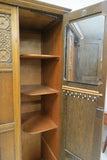 Vintage English Tiger Oak Carved Double Door Wardrobe With Linen Fold Accents