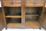 Vintage Dark Oak Welsh Cupboard With Leaded Glass Doors and Linen Fold Accents
