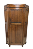 Antique English Tiger Oak Hall Wardrobe or Armoire With Bun Feet and Interior Mirror